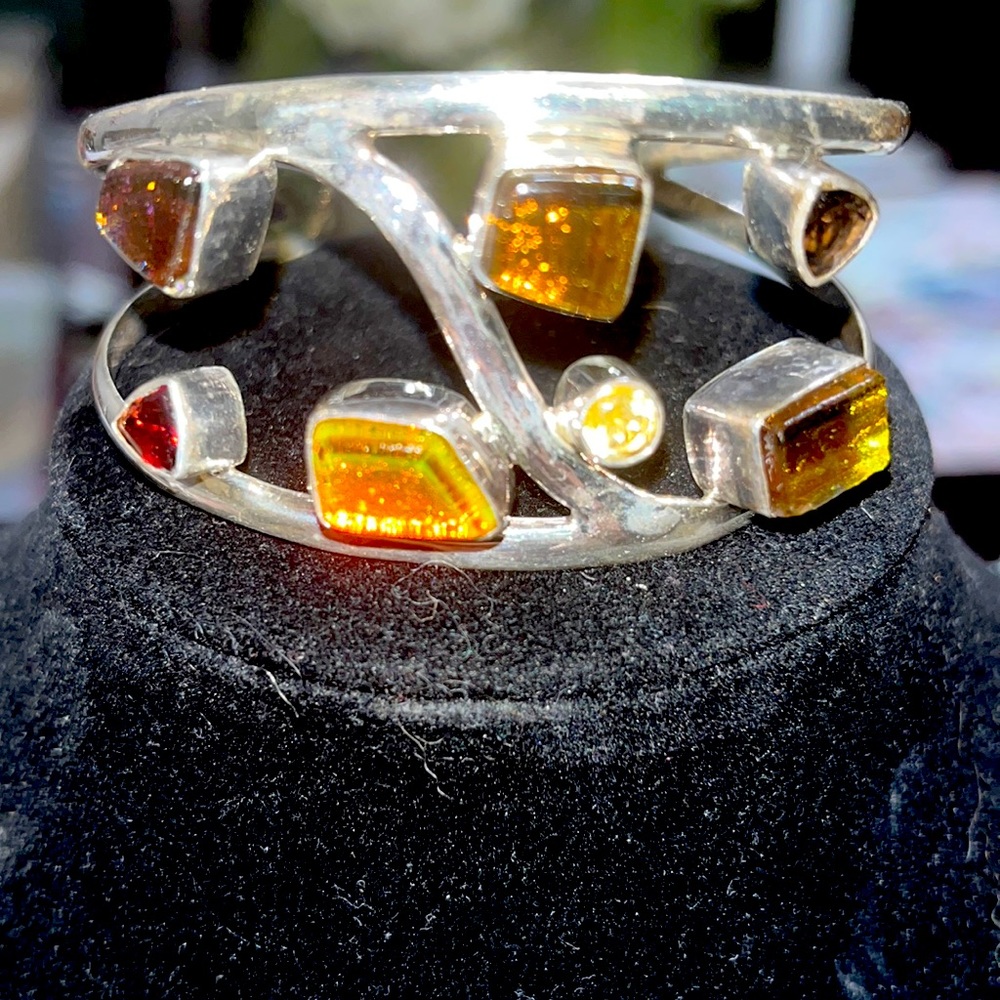 Unique vintage artisan designed Sterling cuff with glass and faceted stones